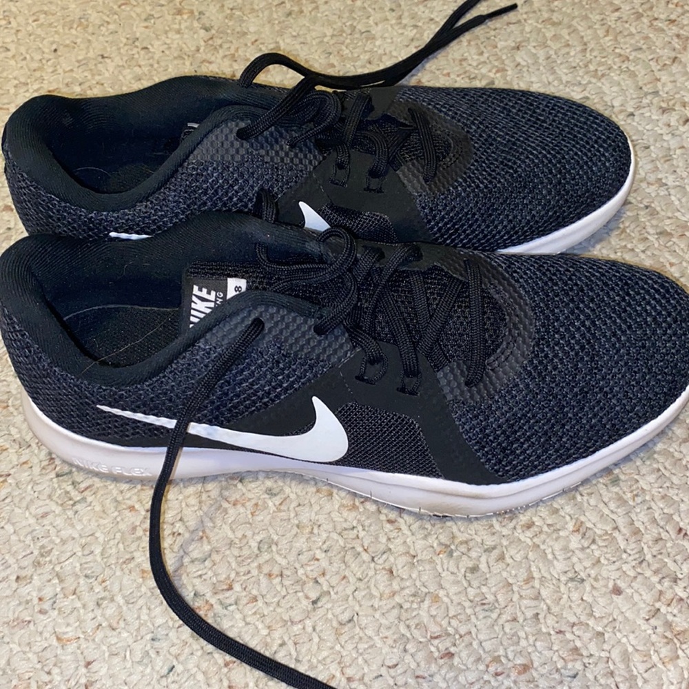 black Nike running shoes